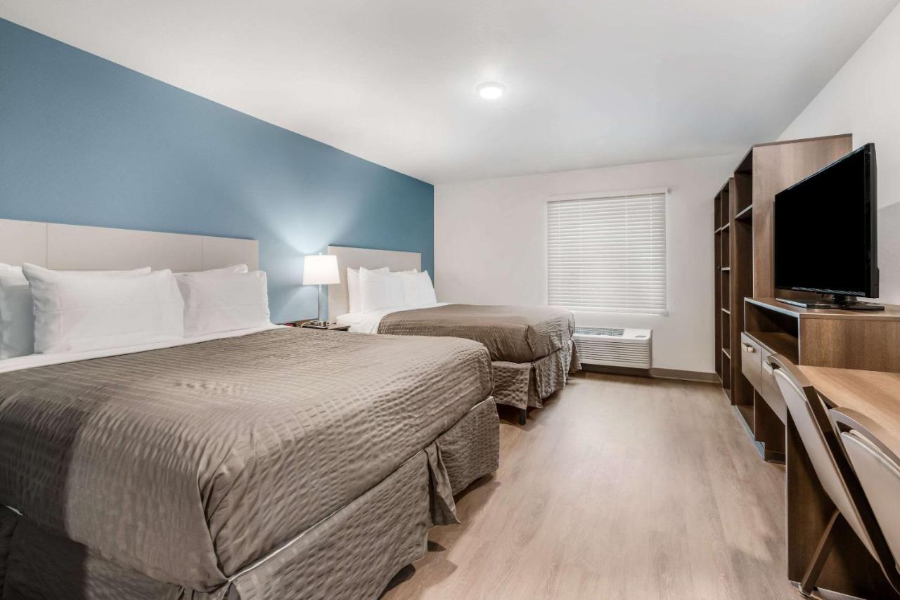 Woodspring Suites Charlotte - University Research Park Room photo